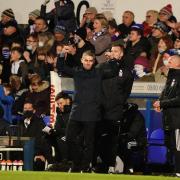 Ipswich Town manager Kieran McKenna punches the air in celebration at the final whistle.