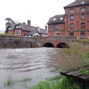 The River Gipping in Needham Market at a high level after prolonged heavy rainfall.
