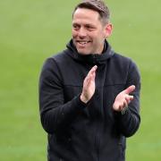 Leam Richardson turned down the chance to be reunited with Paul Cook at Ipswich Town to become permanent manager of Wigan Athletic.