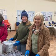 Volunteers from IP17 GNS Fran Raven, Linda Hammond and Lindsey Vickers, work together assembling festive lunches