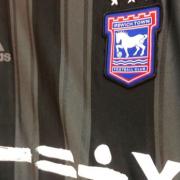 Ipswich Town will wear their all-black clash kit at Wigan Athletic tomorrow