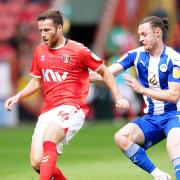Former Ipswich Town striker Will Keane, right, has been in great form for Wigan Athletic