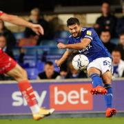 Sam Morsy fires in the ball.