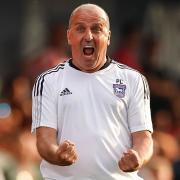 Town manager Paul Cook screams with delight at the final whistle.