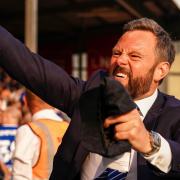 Ipswich Towns Chief Executive Officer Mark Ashton celebrates with fans.