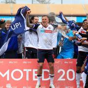 Bolton Wanderers celebrate promotion last season. They visit Ipswich Town today