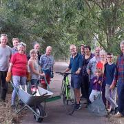 Green party councillors and supporters, members of West Suffolk Hive eco-centre, Beyton Environment group and other volunteers clearing a path between Thurston and Beyton