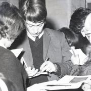 Charlie Watts signing autographs when the Rolling Stones played the Ipswich Gaumont on October 9, 1964