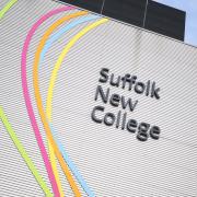 A woman was approached by a man near Suffolk New College who attempted to rob her.