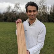 University of Cambridge researcher Dr Darshil Shah with a bamboo cricket bat produced by Suffolk firm Garrard Cricket Bat Company