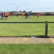 This scene of social distancing sums up the year of 2020, on the opening day of the new season when Bury Town played an FA Cup tie at Cogenhoe United on September 12