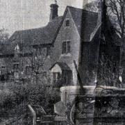 Less than 15 miles from the site of the most haunted house in England, another rectory in Suffolk was plagued by an evil spirit. Pictured is EADT library cutting of a bullddozer filling the excavated site of the haunted Borley Rectory in April 1959.