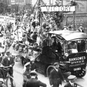 A parade passing from Norwich Road into St Matthews Street, at Barrack Corner, Ipswich, to mark victory in the First World War. It was held in the summer of 1919, judging by the date on the photograph. Picture: DAVID KINDRED COLLECTION