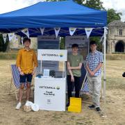 Vattenfall\'s Will Sealey (left) with summer interns Thomas White (right) and Joe Bates at an event in the Bishop\'s Garden, Norwich