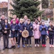 The Christmas trees in Bury St Edmunds have been decorated with self-portraits of local school children this year, with each tree completed by a different year group.