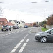 Campaigners would like to see a pedestrian crossing to improve safety at the junction of Bredfield Road and Woods Lane