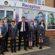 Headteacher Jon Winn with Breckland School pupils following their 'Good' Ofsted rating.