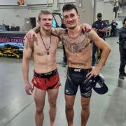 Suffolk's Arnold Allen, left, and Max Holloway after their fight in Kansas City last night