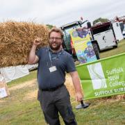 Patrick Wrenn from Suffolk New College helping to set up its stand at the Suffolk Show.