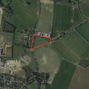 Plans have been revealed for a five-home development given backing by the parish council in return for the gift of a parcel of land at the heart of the village.