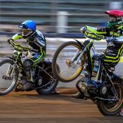 Ipswich Witches duo Danny King, left, and Jason Doyle celebrate on their way to a victory in heat 15