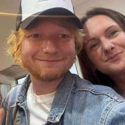 Ed took pictures with customers waiting for their fish and chips