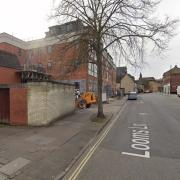 The offices and car parking area at 12 Looms Lane, in Bury St Edmunds, could be transformed into seven homes