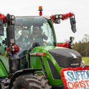 Organisers Louise Davy and Katherine Cross lead off the Christmas Tractor Run