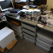 Thousands of DVDs were seized during the investigation