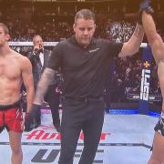 Movsar Evloev has his hand raised after beating Suffolk's Arnold Allen at UFC 297