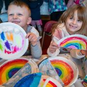 Ted Ross and Rosie Bristow help to make the rainbow for use in the production of Noah's Flood