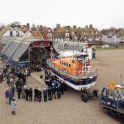 The Rt Rev Martin Seeley blesses the Aldeburgh lifeboat on the 200th anniversary of the RNLI