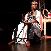 The play follows Mama Afrika