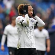 Ipswich Town star Marcus Harness reacts after the late defeat at Cardiff City