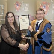 Ana Marques receiving her award from Chris Wood, Master of The Worshipful Company of Butchers