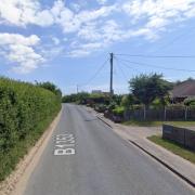 A woman has been charged after a crash in a Suffolk village