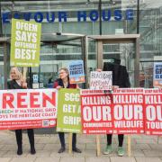 Protestors gathered outside the county council's Endeavour House office on Thursday