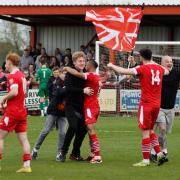 Needham Market players and fans celebrate promotion to the National League North