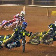 Adam Ellis (blue helmet) and Emil Sayfutdinov (red) leading  Dan Bewley in heat six, although the Belle Vue rider came through to win.