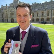 Keith Deller, who was born in Ipswich, with his MBE