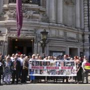 Victims and campaigners outside Central Hall in Westminster, London, after the publication of the Infected Blood Inquiry report yesterday.