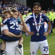 Massimo Luongo, pictured celebrating promotion to the Premier League with Ipswich Town alongside his family.