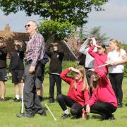 Ambassador Dave Green teaches pupils at Bacton Primary School about rockets