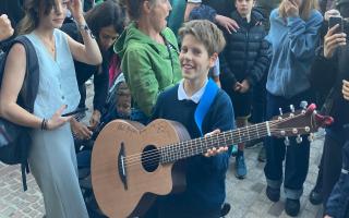 A lucky ten-year-old came away with a priceless memento after attending Ed Sheeran\'s impromptu concert on the steps of Ipswich town hall.