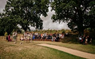The wedding of Harriet and Charles Atkins at Easton Grange's outdoor amphitheatre in Suffolk