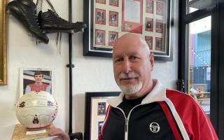 Wayne Bennett - pictured with football signed by Martin Peters - will be opening 'Past & Presents' on April 1 at Beach Street. Credit: ACC Art Books