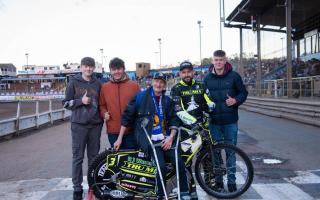 Robin Kett (middle) treated three boys to a night at the speedway to thank them for saving him when he fell in a Suffolk park last month.