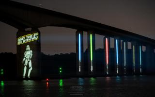 A storm trooper and lightsabers were projected onto the Orwell Bridge
