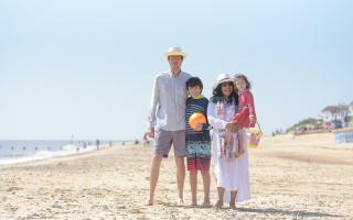 A family on Southwold beach
