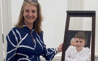 Claire Kavanagh with a photo of son Niall at a race day held in his honour last year.
